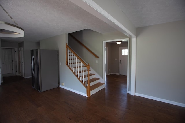 1805 Pointe Ct, Lebanon, TN 37087 - entrance foyer with a textured ceiling, stairs, baseboards, and wood finished floors