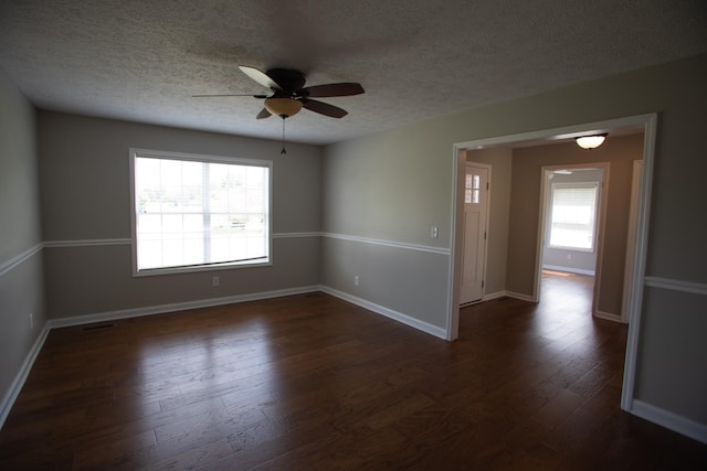 1805 Pointe Ct, Lebanon, TN 37087 - spare room featuring dark wood-style flooring, a textured ceiling, ceiling fan, and baseboards
