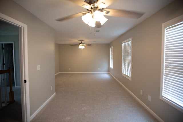 1805 Pointe Ct, Lebanon, TN 37087 - carpeted spare room featuring a ceiling fan and baseboards