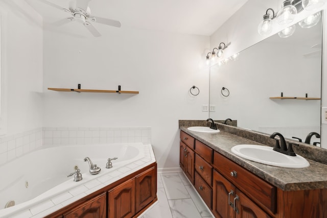 bathroom featuring a bathing tub, vanity, and ceiling fan