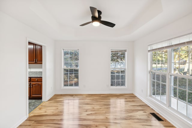 interior space featuring light wood-type flooring and ceiling fan