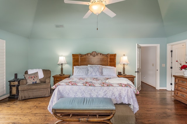 bedroom featuring hardwood / wood-style floors, lofted ceiling, and ceiling fan