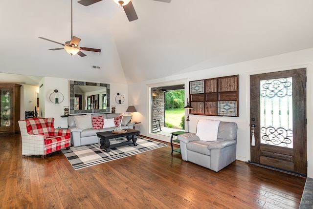 living room with ceiling fan, a healthy amount of sunlight, dark hardwood / wood-style flooring, and high vaulted ceiling