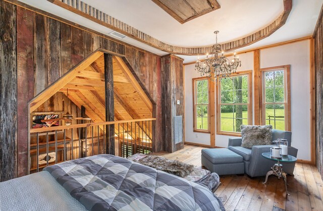 884 Pinnacle Hill Rd, Kingston Springs, TN 37082 - bedroom with a chandelier, hardwood / wood-style flooring, and baseboards
