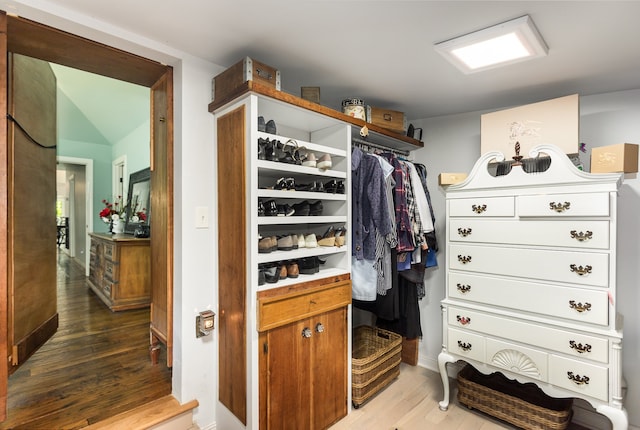 walk in closet featuring hardwood / wood-style flooring