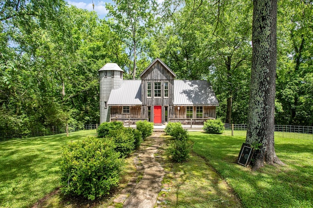 view of front of home with a front yard