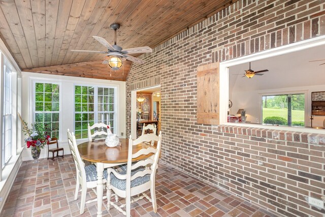 884 Pinnacle Hill Rd, Kingston Springs, TN 37082 - dining room featuring ceiling fan, brick wall, brick floors, wooden ceiling, and vaulted ceiling