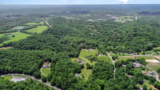 884 Pinnacle Hill Rd, Kingston Springs, TN 37082 - aerial overview of property's location with a heavily wooded area