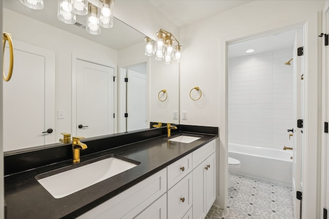 full bathroom featuring vanity, tile patterned floors, tub / shower combination, and toilet