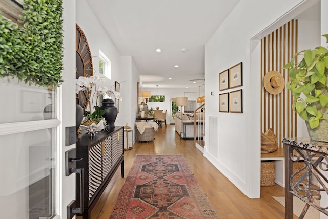 hallway featuring light hardwood / wood-style flooring