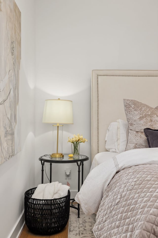 bedroom featuring wood-type flooring