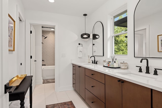 bathroom with shower with separate bathtub, vanity, and tile patterned flooring