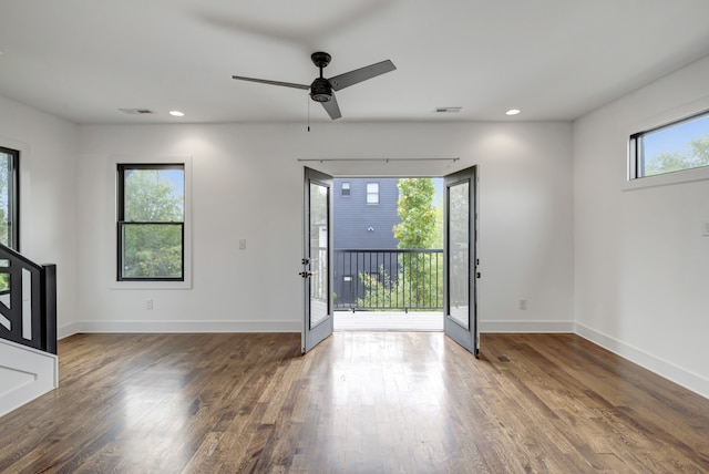 interior space featuring french doors, wood-type flooring, a healthy amount of sunlight, and ceiling fan