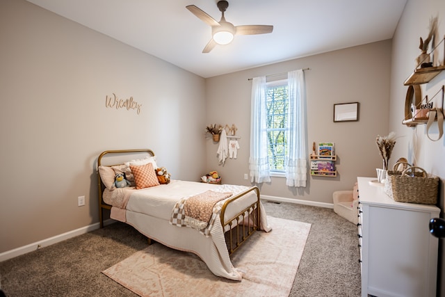 bedroom featuring ceiling fan and light carpet