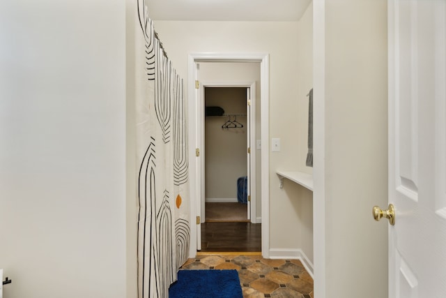 hallway featuring hardwood / wood-style floors