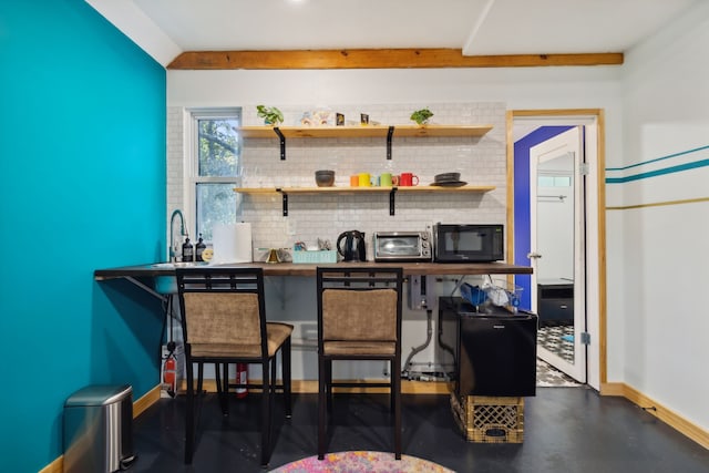 bar with tasteful backsplash and sink