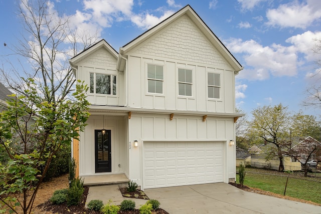 view of front of property with a garage