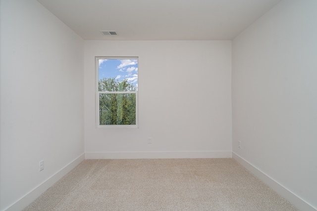 empty room featuring carpet floors