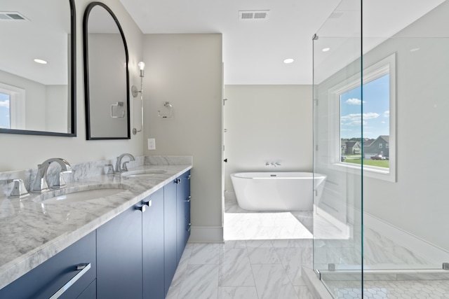 bathroom with plus walk in shower and vanity