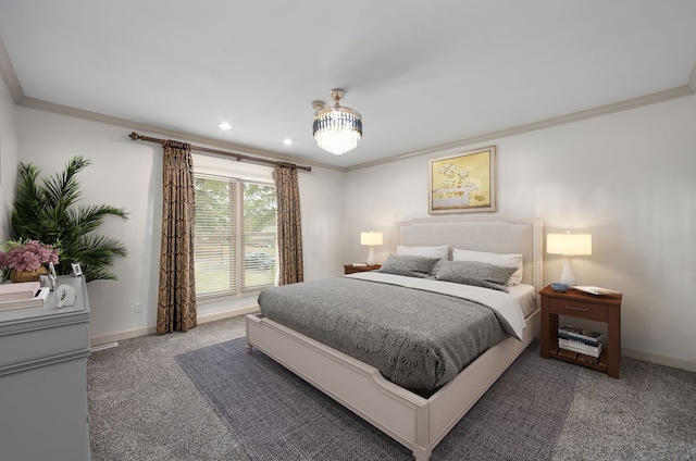 bedroom featuring crown molding and carpet