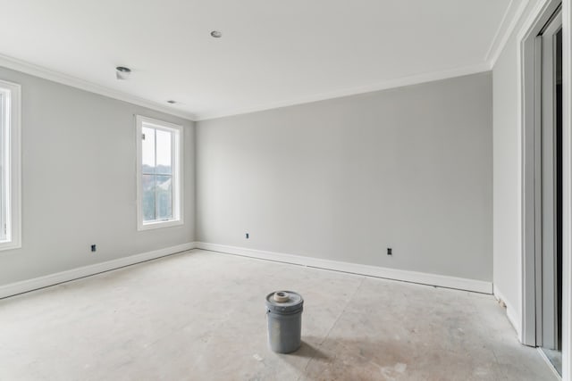 empty room featuring ornamental molding