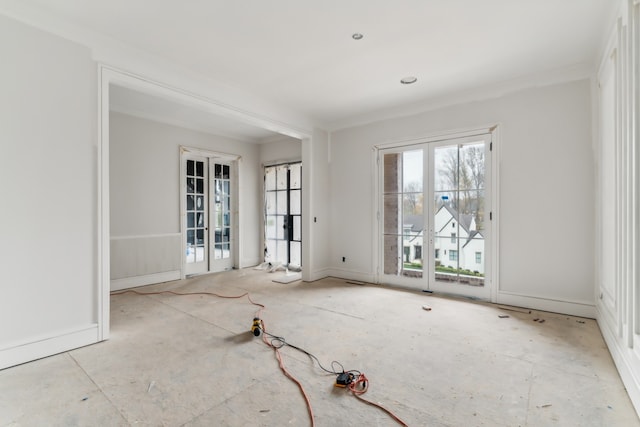 spare room featuring french doors