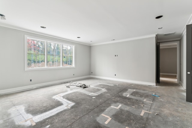 unfurnished room with crown molding