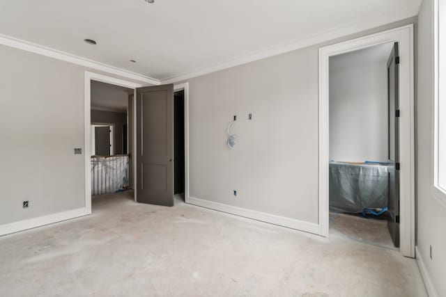 unfurnished bedroom featuring crown molding