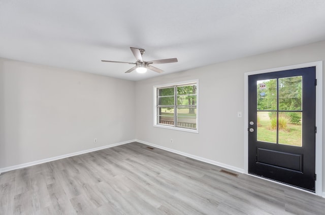 entrance foyer featuring light wood-type flooring and ceiling fan