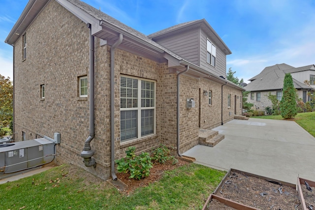 view of home's exterior featuring a patio area