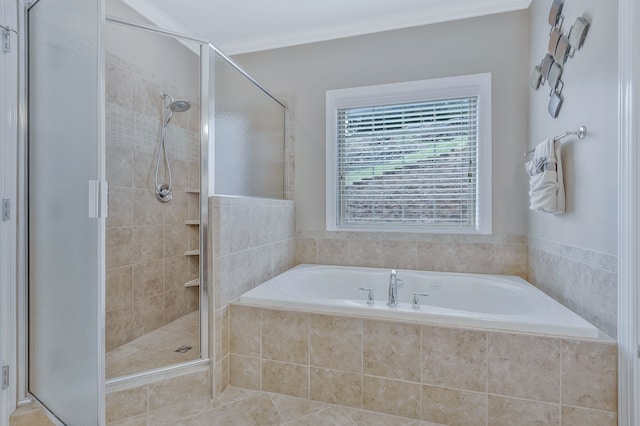 bathroom with shower with separate bathtub, tile patterned floors, and crown molding