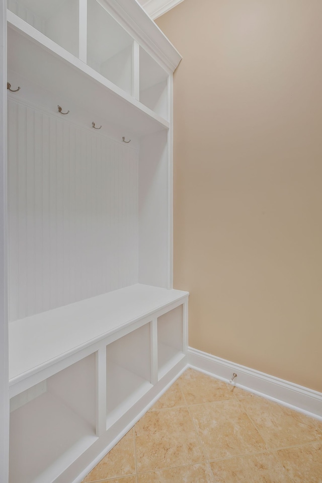 mudroom with tile patterned floors