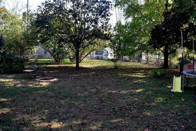 view of yard featuring a trampoline