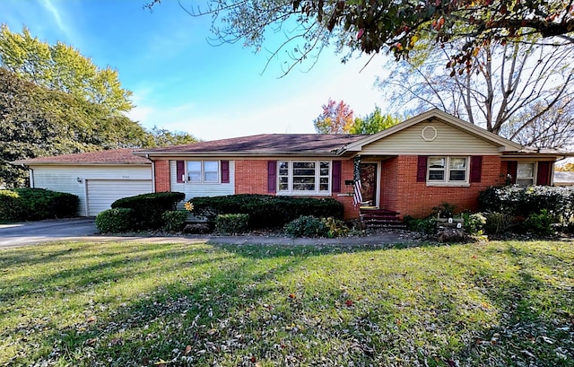 ranch-style house with a garage and a front yard