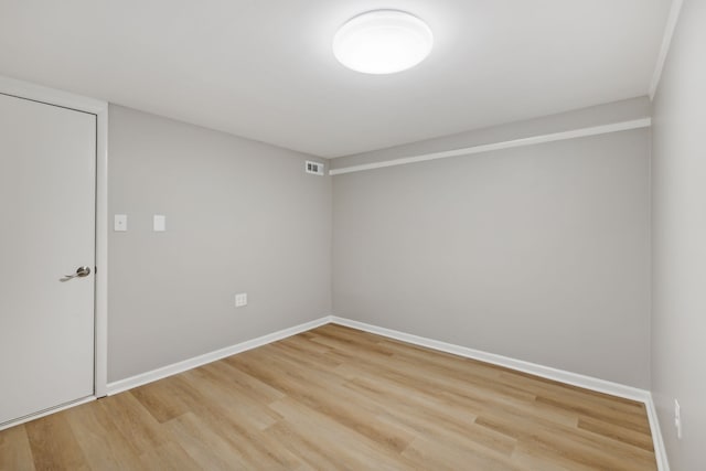 spare room featuring hardwood / wood-style flooring