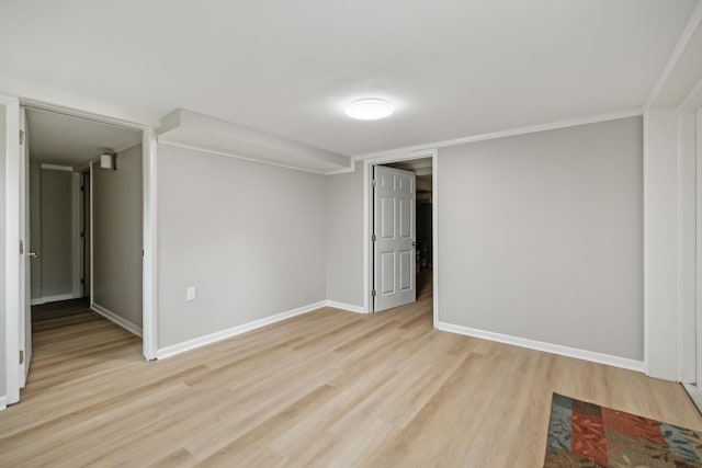 spare room with light hardwood / wood-style floors