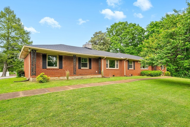 3 Hillwood Ct, Clarksville, TN 37043 - view of front facade with brick siding, a chimney, and a front lawn
