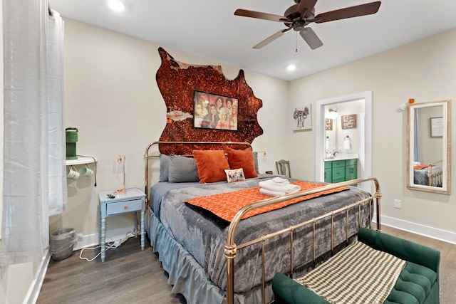 bedroom featuring wood-type flooring, ceiling fan, and connected bathroom