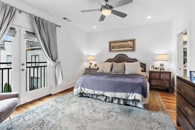 bedroom with hardwood / wood-style flooring, access to exterior, and ceiling fan