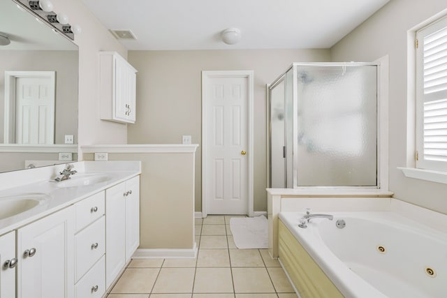 bathroom with vanity, tile patterned floors, and separate shower and tub