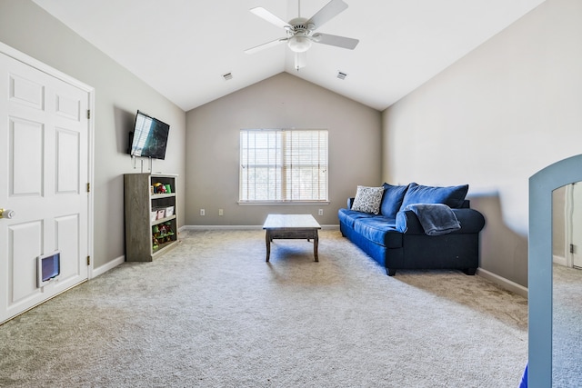 living room with lofted ceiling, light colored carpet, and ceiling fan