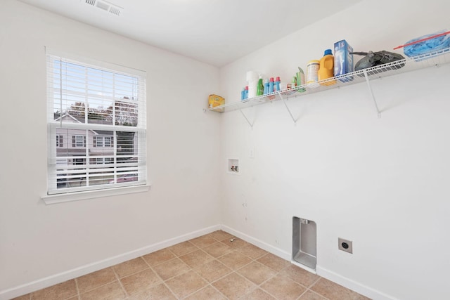 washroom featuring washer hookup and electric dryer hookup