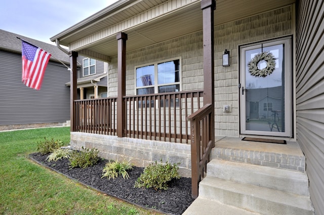 entrance to property with a porch