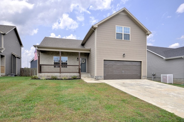 view of front of home featuring a garage, a porch, and a front yard