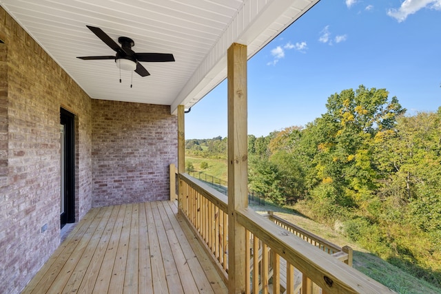 wooden deck with ceiling fan