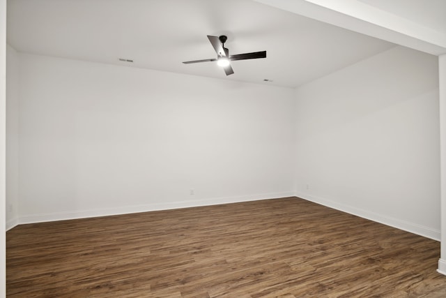 unfurnished room featuring ceiling fan and dark hardwood / wood-style floors