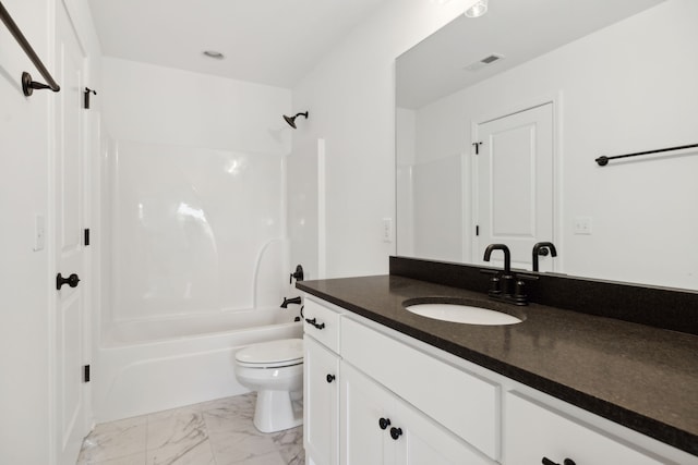 full bathroom featuring toilet, washtub / shower combination, and vanity