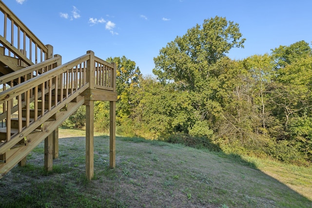 view of yard featuring a wooden deck