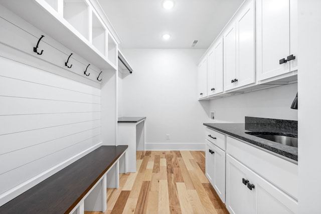 mudroom featuring light hardwood / wood-style floors and sink