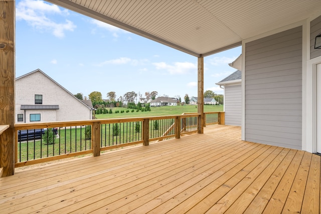 wooden deck with a yard